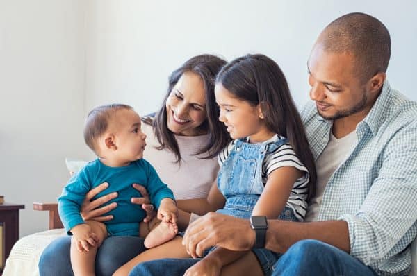 Family playing with baby